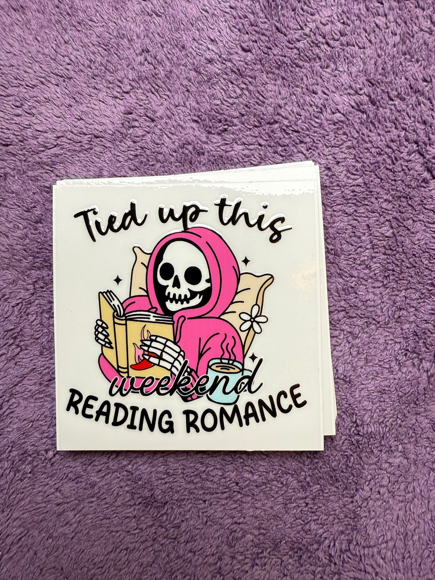 Tied up this weekend, reading romance
